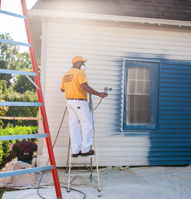 certapro painter exterior painting white house to blue